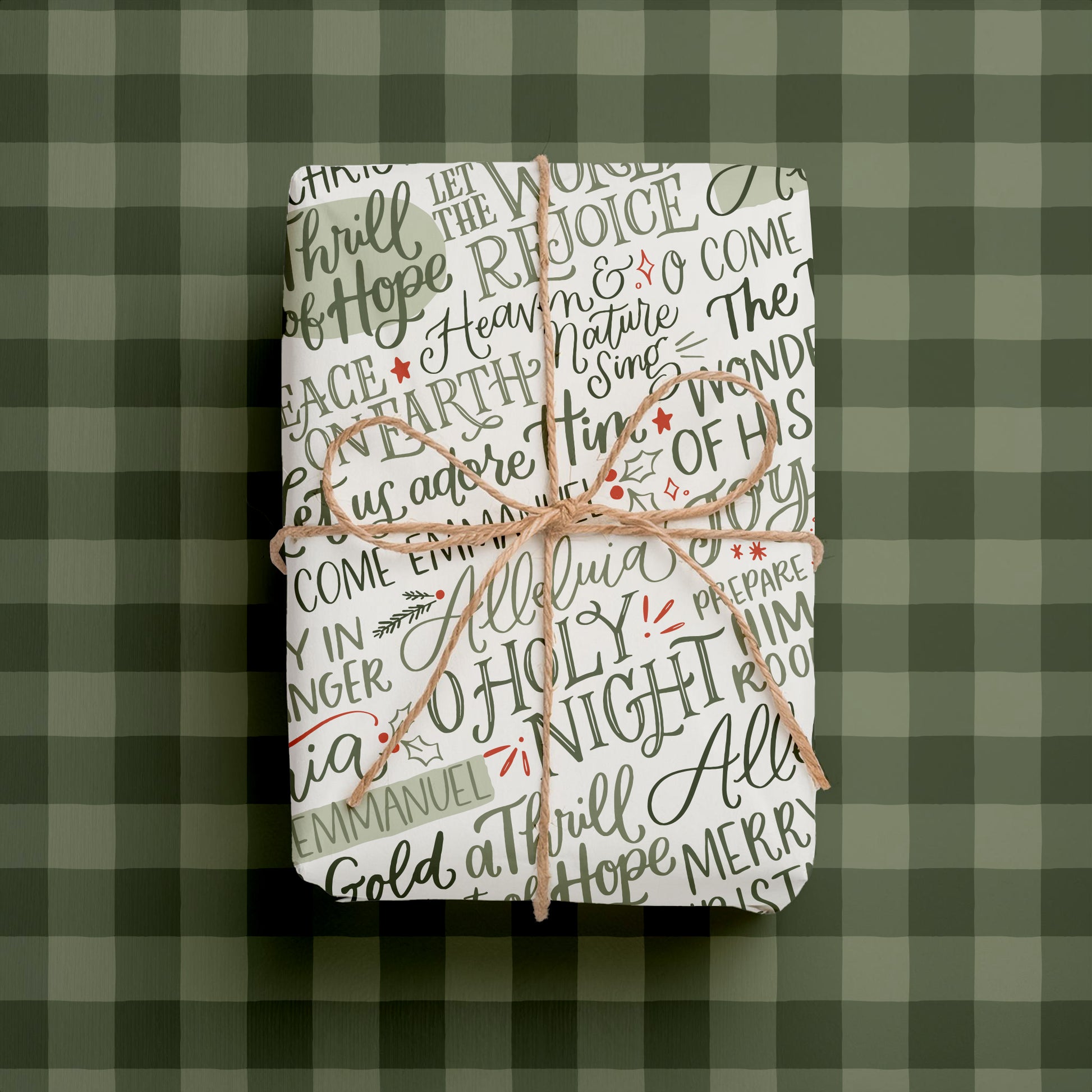 Double-sided Christmas Christian  wrapping paper sheets with hand-lettered phrases with green buffalo check plaid.