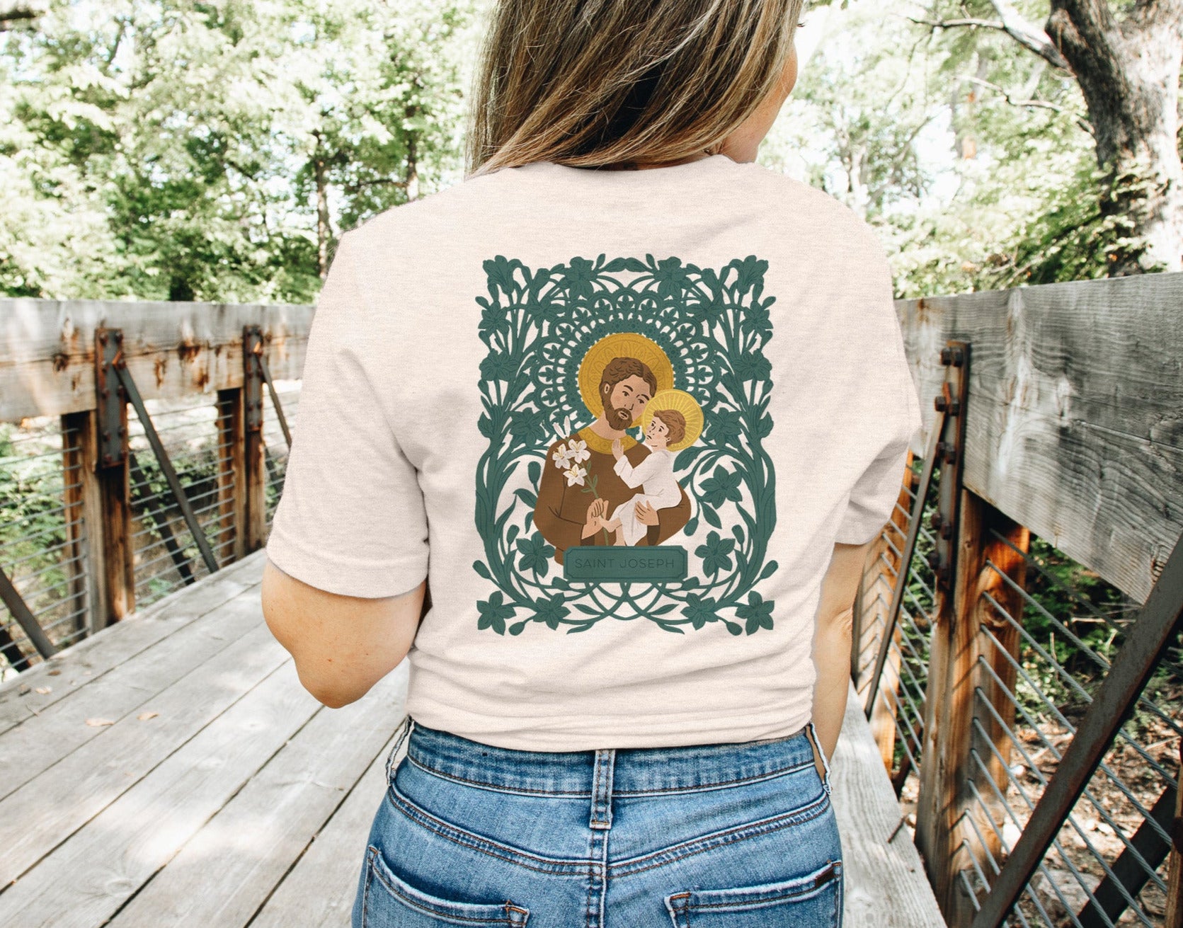 Image of Saint Joseph T-Shirt. Hand drawn Saint Joseph and Child Jesus T-Shirt available now at Holy Hour Gifts.